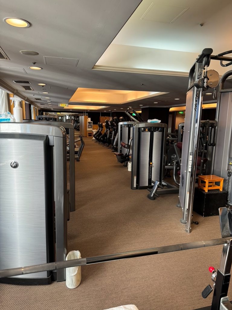 Strength and cardio equipment lined up at Hotel Allamanda Tokyo