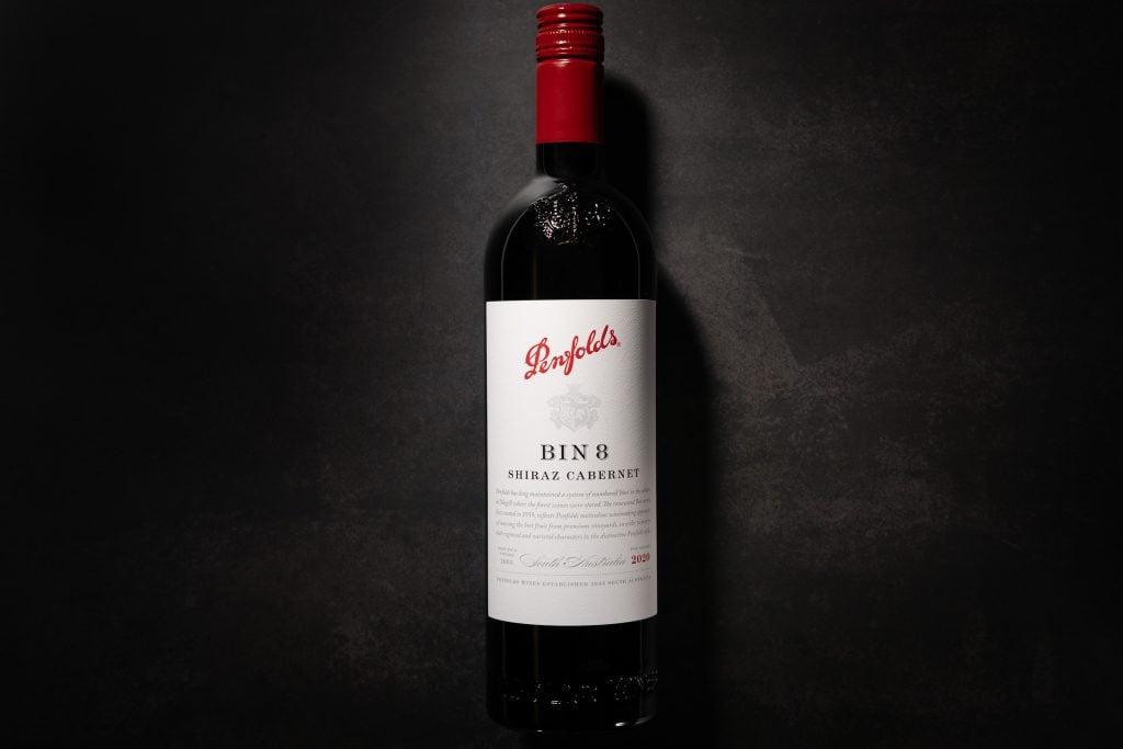 Penfolds Bin 8 Shiraz Cabernet 2020 bottle on a dark stone surface