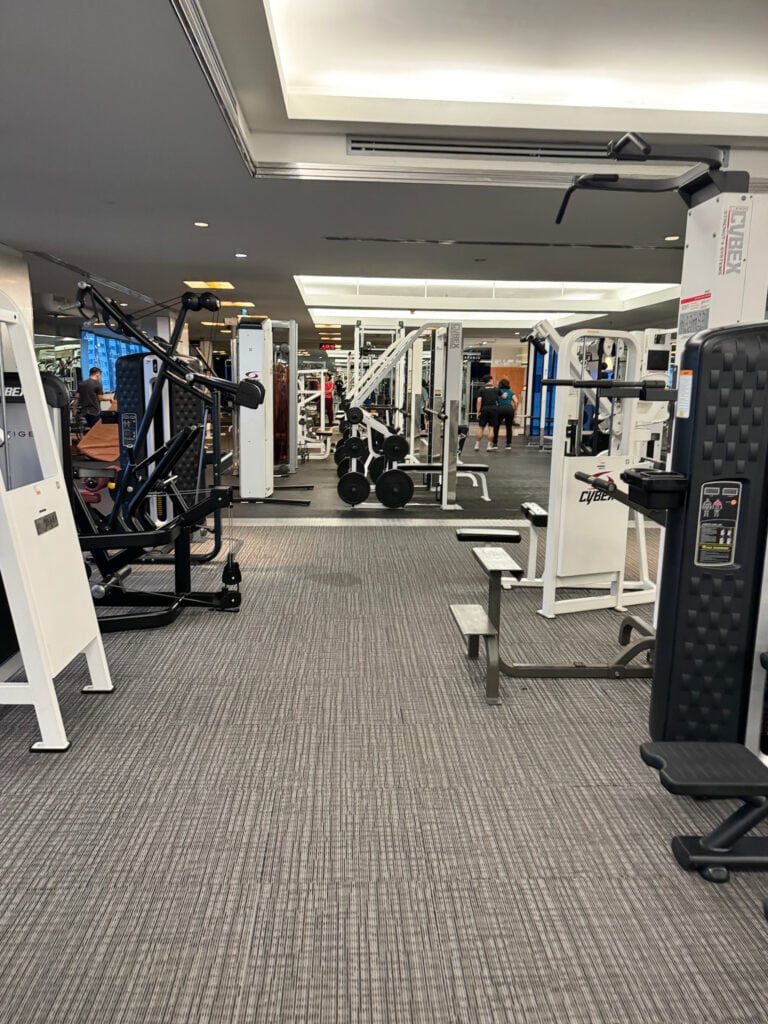 Gym at Pathumwan Princess Hotel Bangkok with strength machines and free weights