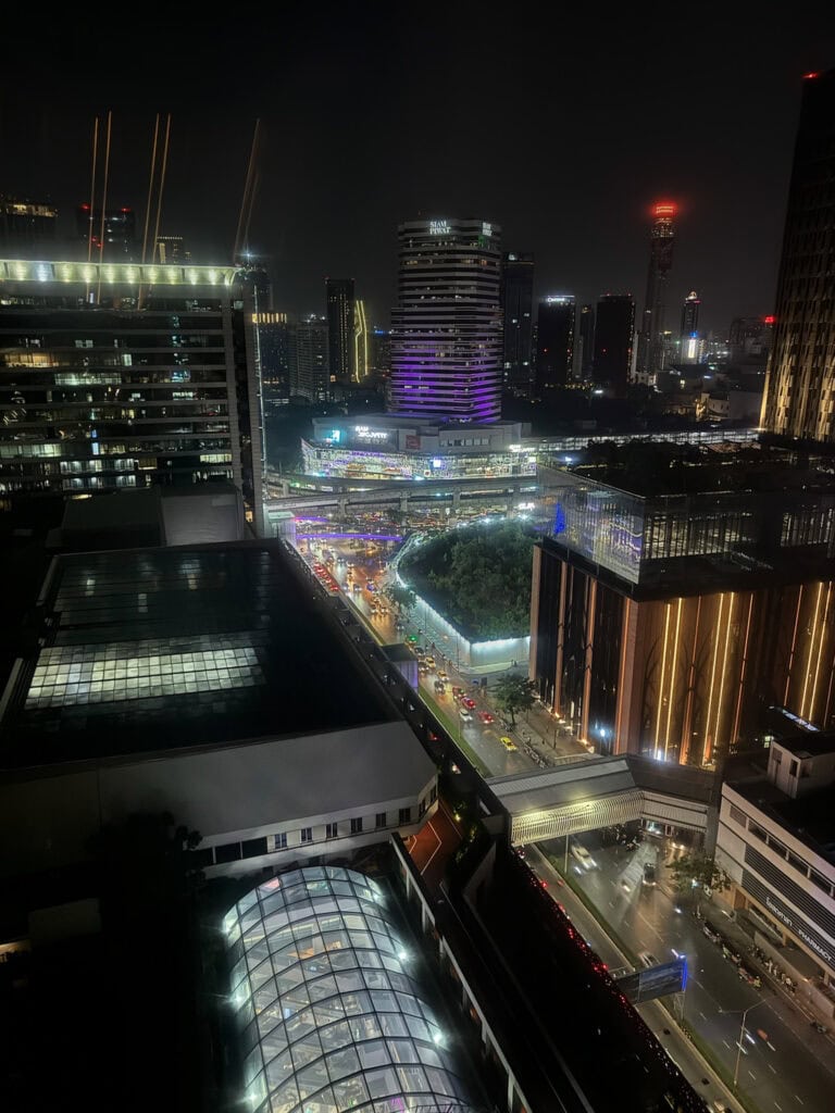Night view from Grand Deluxe King Room at Pathumwan Princess Hotel overlooking MBK and Bangkok skyline