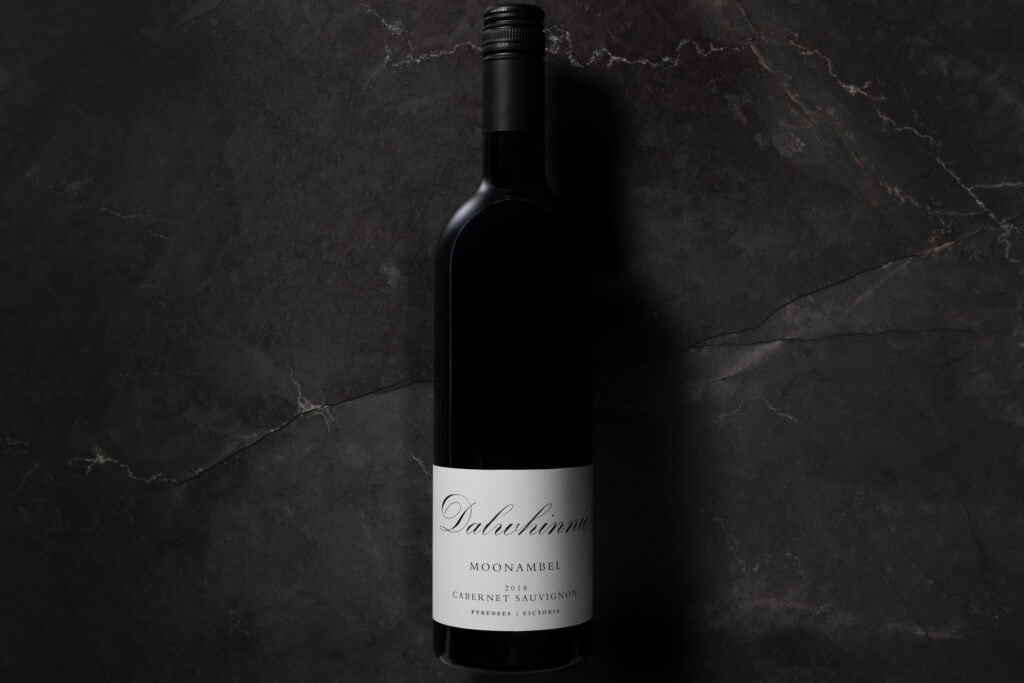 Dalwhinnie Cabernet Sauvignon 2018 bottle on dark marble surface