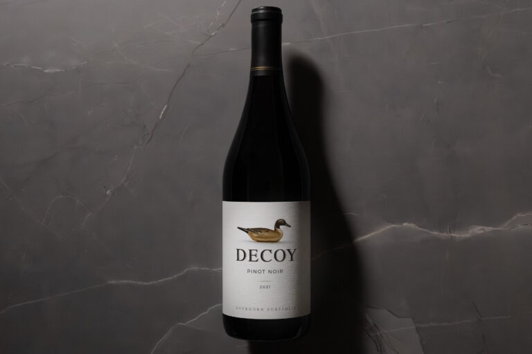 Decoy Pinot Noir 2021 bottle on grey marble background
