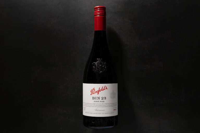 Penfolds Bin 23 Pinot Noir 2021 bottle on a dark stone background