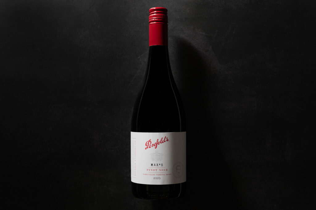 Penfolds Max’s Pinot Noir 2023 bottle on a dark textured background with red cap and white label