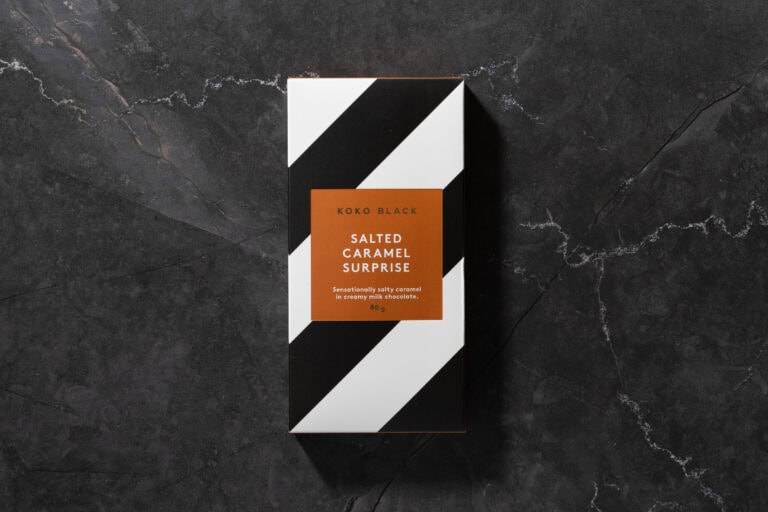 Koko Black Salted Caramel Surprise chocolate bar in black and white striped packaging