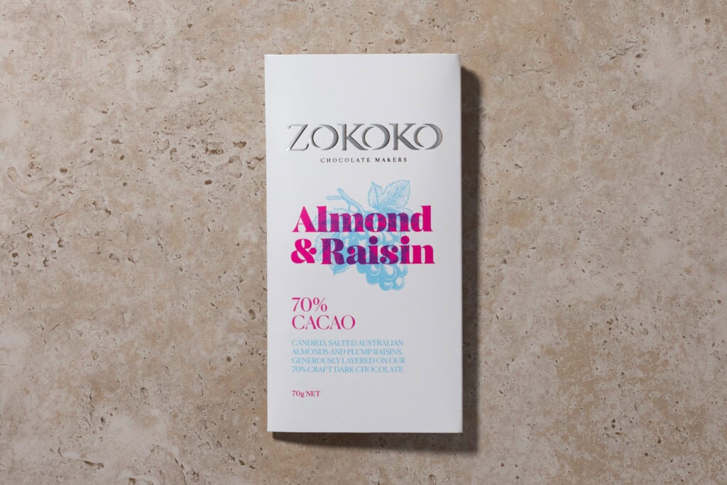 Zokoko Almond & Raisin 70% chocolate packaging on a stone surface