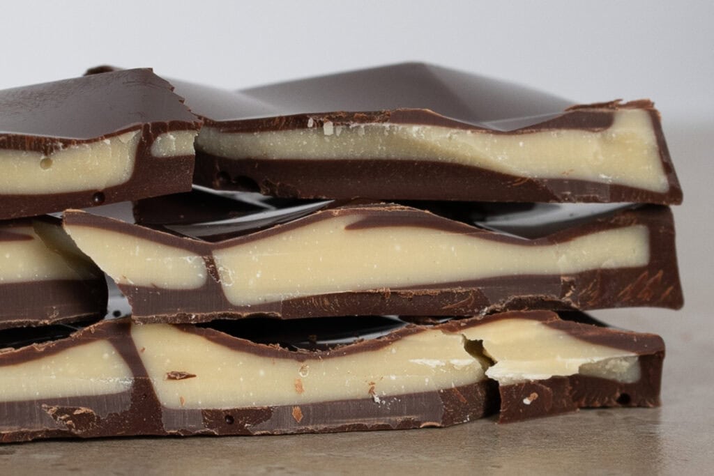 Zokoko Dark + White Mint chocolate cross section showing white mint centre