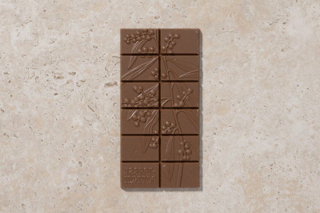 Jasper + Myrtle Caffè Bianco white chocolate bar with embossed botanical pattern
