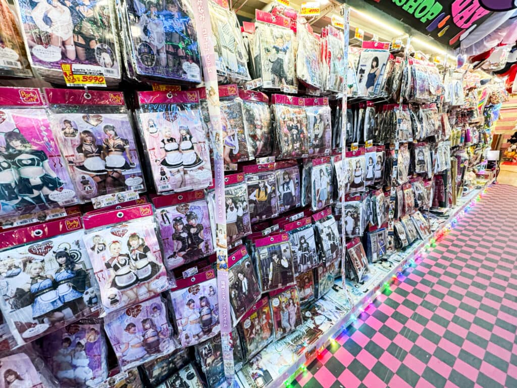 Wall of packaged cosplay costumes inside a Donki store in Tokyo