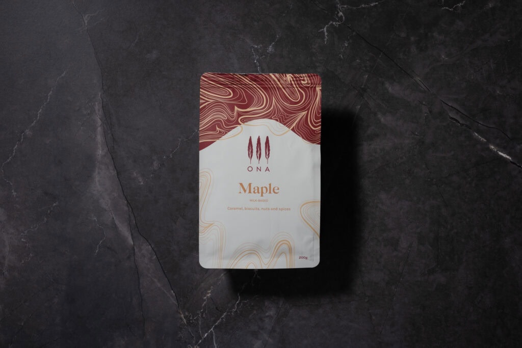 ONA Maple coffee bag on dark stone surface