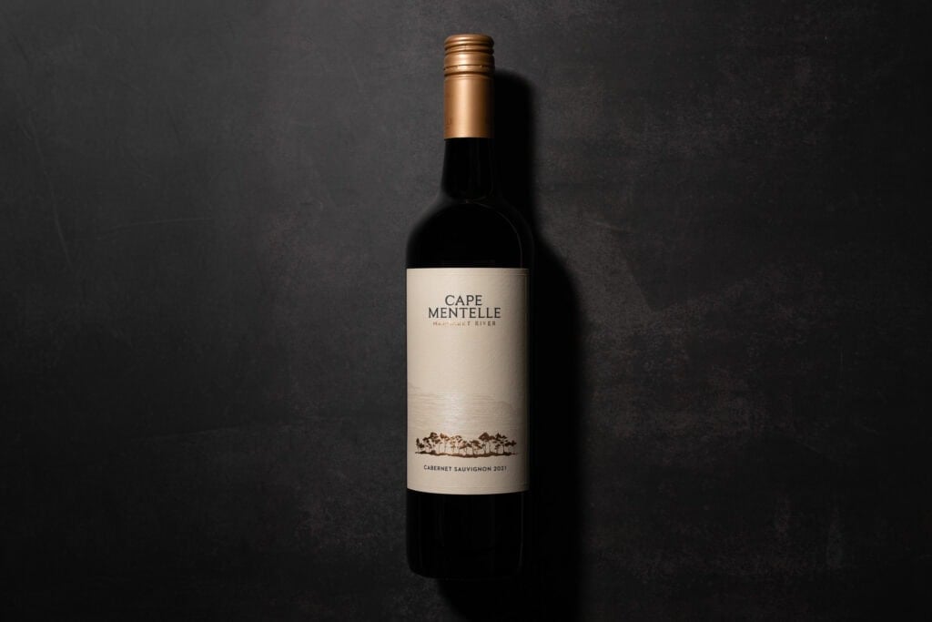 Cape Mentelle Cabernet Sauvignon 2021 bottle on dark textured background