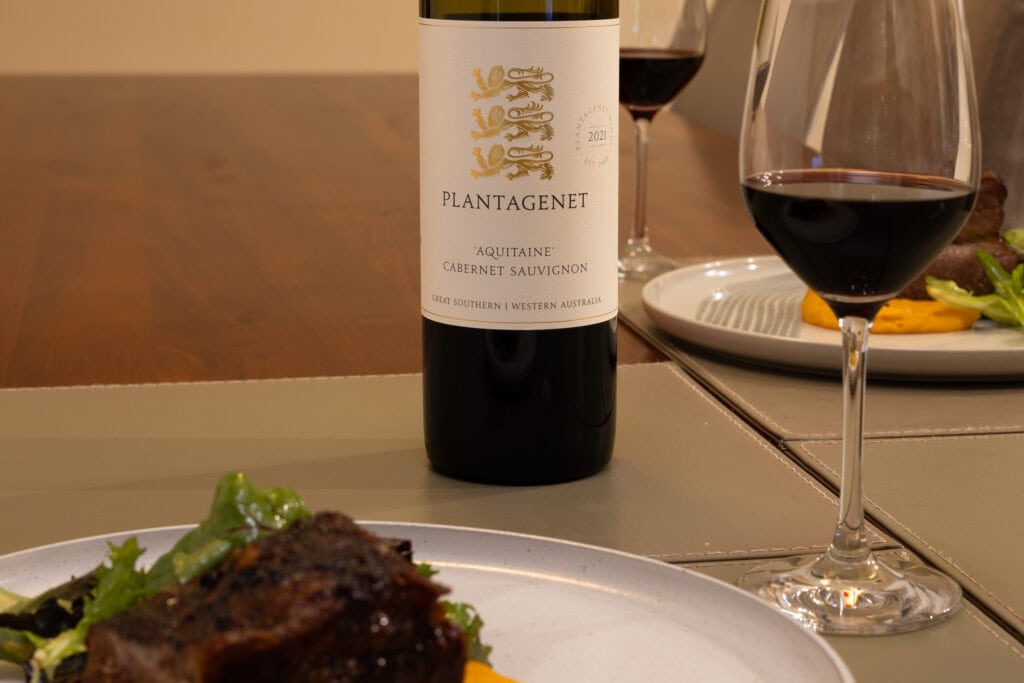 Plantagenet Aquitaine Cabernet Sauvignon 2021 with steak and red wine glass