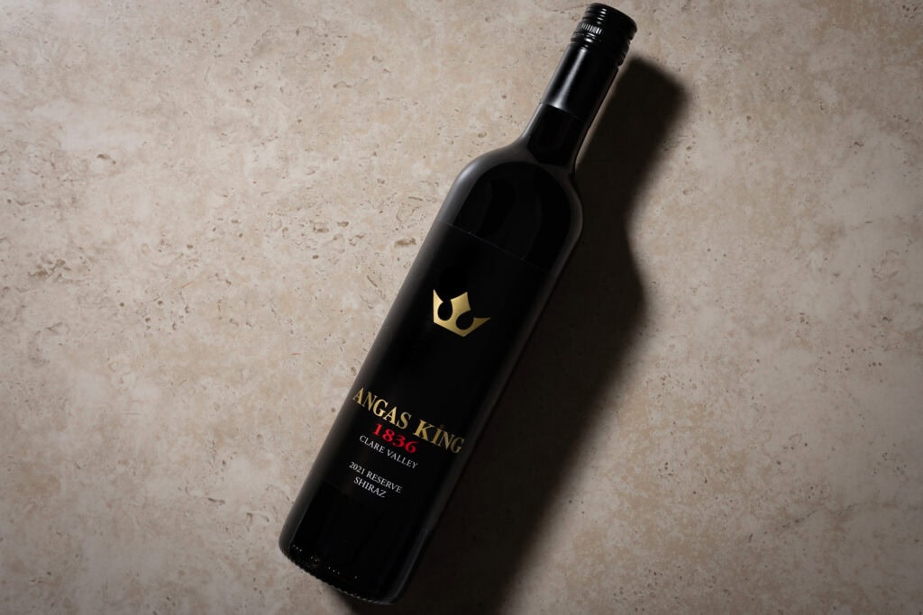 Angas King 1836 Reserve Shiraz 2021 bottle photographed on stone surface