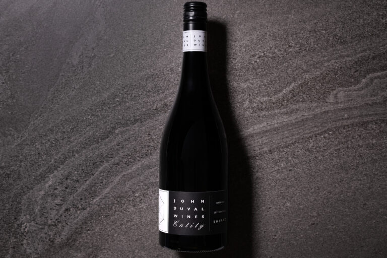 John Duval Entity Shiraz 2022 bottle against dark stone surface