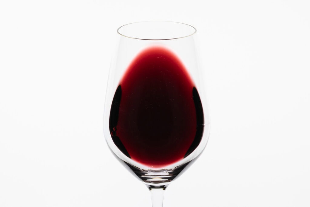 Penfolds FWT 585 Cabernet Sauvignon Merlot Petit Verdot 2022 showing deep ruby and purple colour in the glass