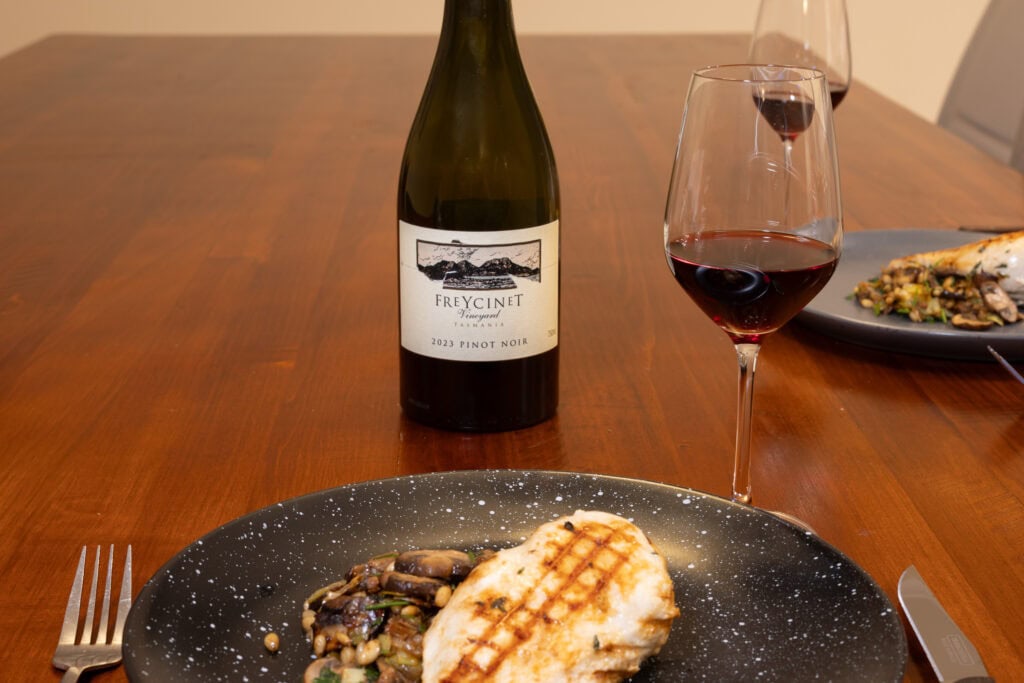 Freycinet Vineyard Pinot Noir 2023 served with grilled chicken breast and sautéed mushrooms during tasting