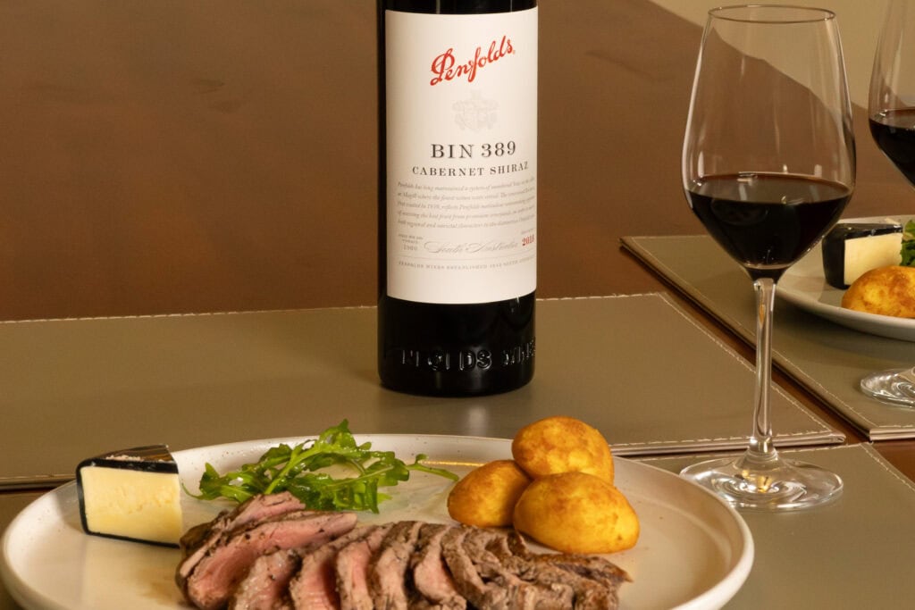 Penfolds Bin 389 Cabernet Shiraz 2018 paired with sliced ribeye, Black Bomber cheddar, rocket salad and roasted potatoes