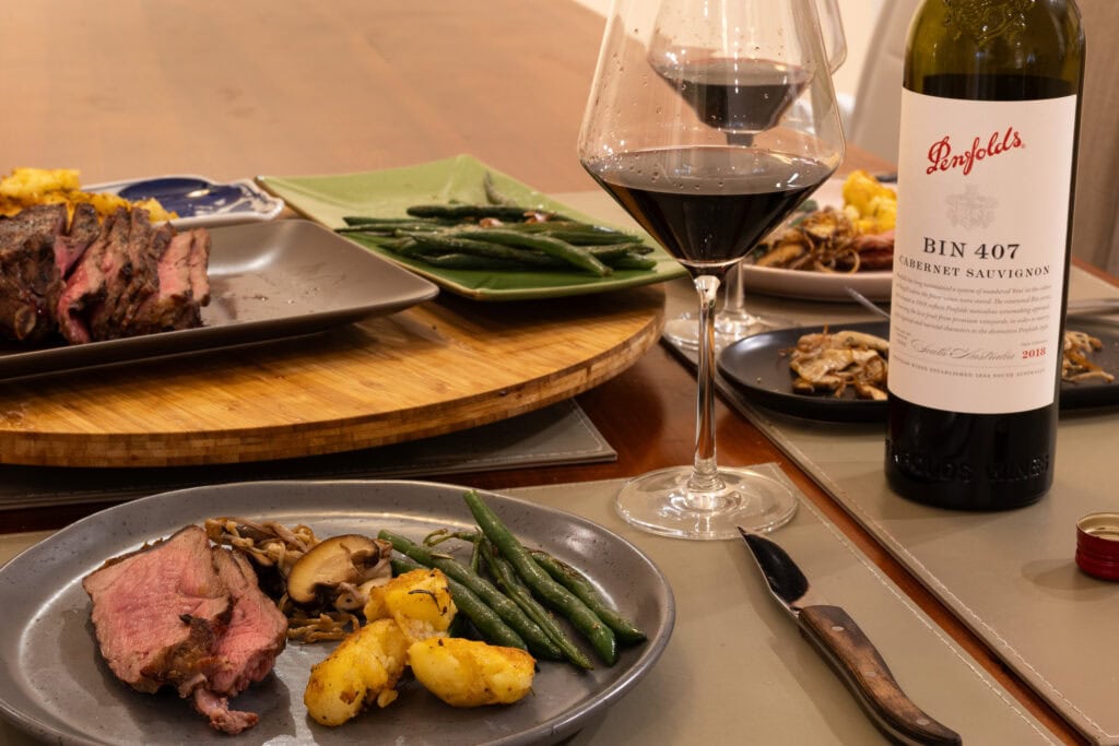 Penfolds Bin 407 Cabernet Sauvignon 2018 paired with BBQ ribeye, potatoes, green beans, and mushrooms