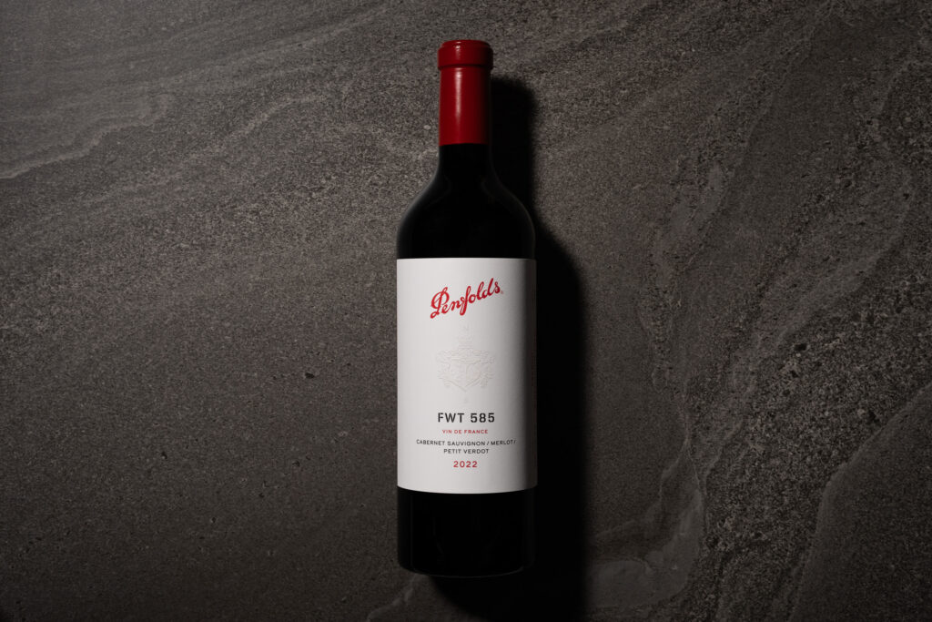 Penfolds FWT 585 Cabernet Sauvignon Merlot Petit Verdot 2022 bottle on dark stone background