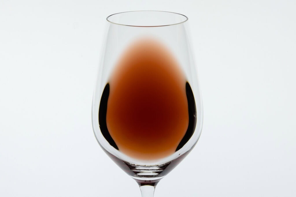 Appearance of Riposte The Sabre Pinot Noir 2023 showing translucent garnet colour and clear rim
