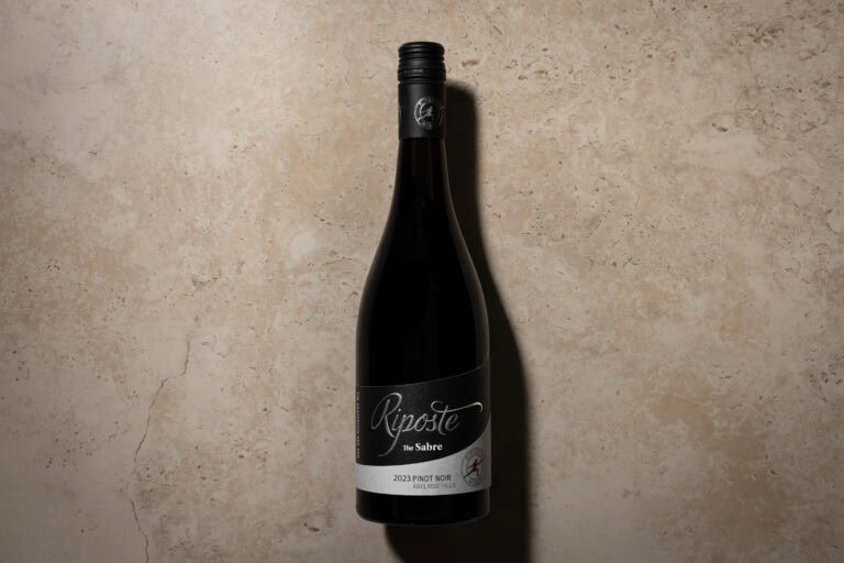 Riposte The Sabre Pinot Noir 2023 bottle from Adelaide Hills on a travertine background.